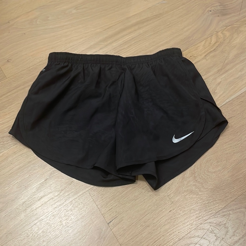 nike women’s small black shorts with cute patter never worn!